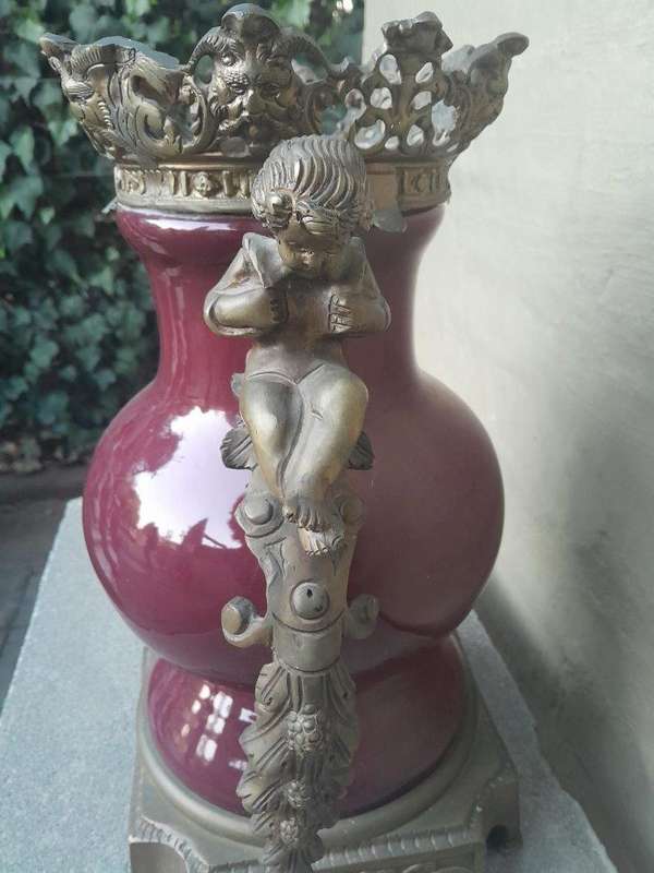 A Pair Of French Decorative Porcelain Cherub & Ormolu Urns