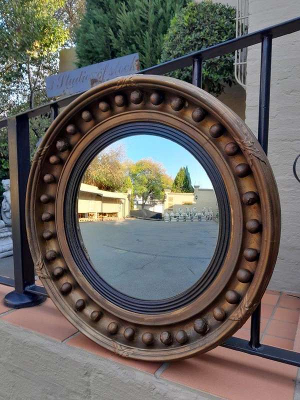 An Antique Gilt-Wood Convex Mirror