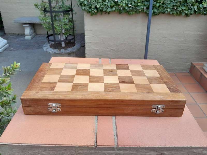 A 20th Century Wooden Chess Board with Mystery Ball Pieces