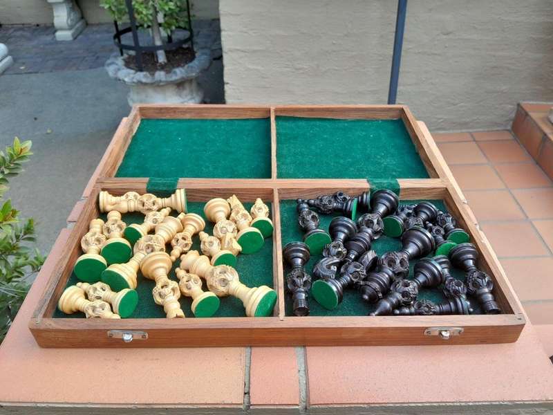 A 20th Century Wooden Chess Board with Mystery Ball Pieces