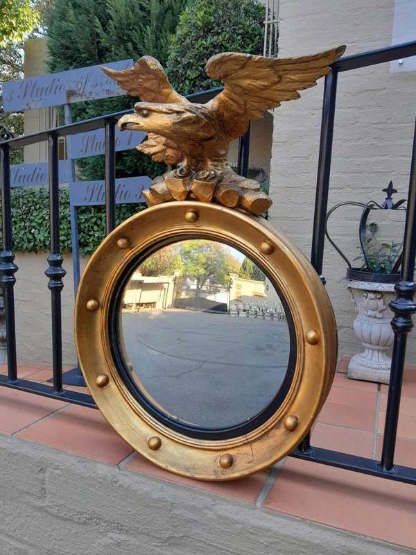 A 20TH Century Regency Style Eagle Gilt Painted Convex Mirror