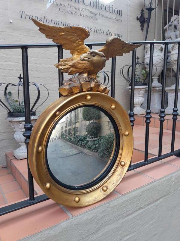 A 20TH Century Regency Style Eagle Gilt Painted Convex Mirror