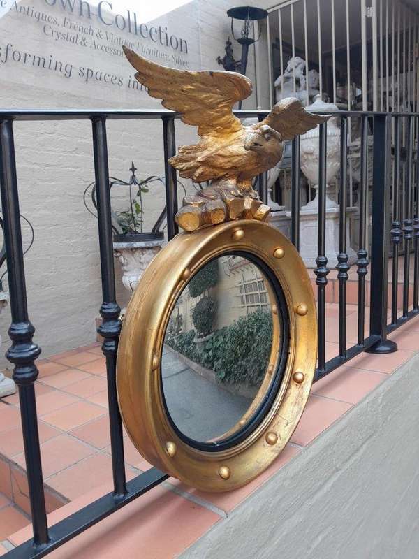 A 20TH Century Regency Style Eagle Gilt Painted Convex Mirror