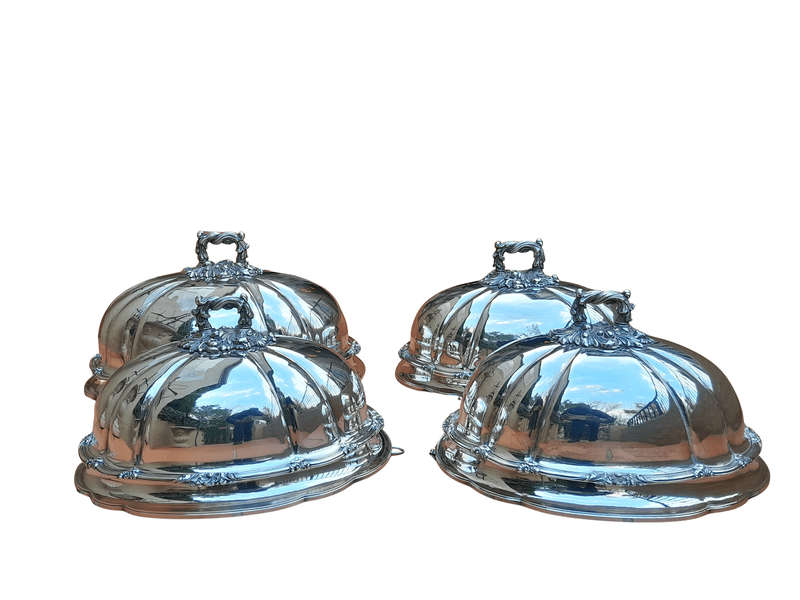 An Antique Victorian Set of Four Silver Plated Graduated Food Domes