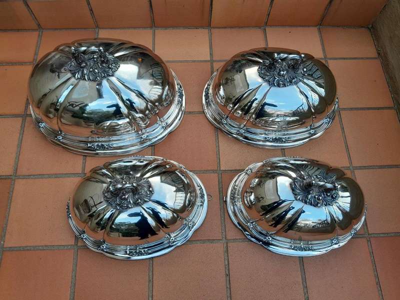 An Antique Victorian Set of Four Silver Plated Graduated Food Domes
