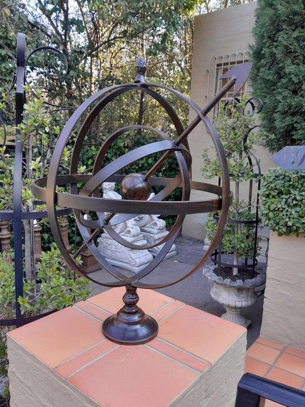A Decorative Wrought Iron Armillary Sphere in a Antique Brown Finish
