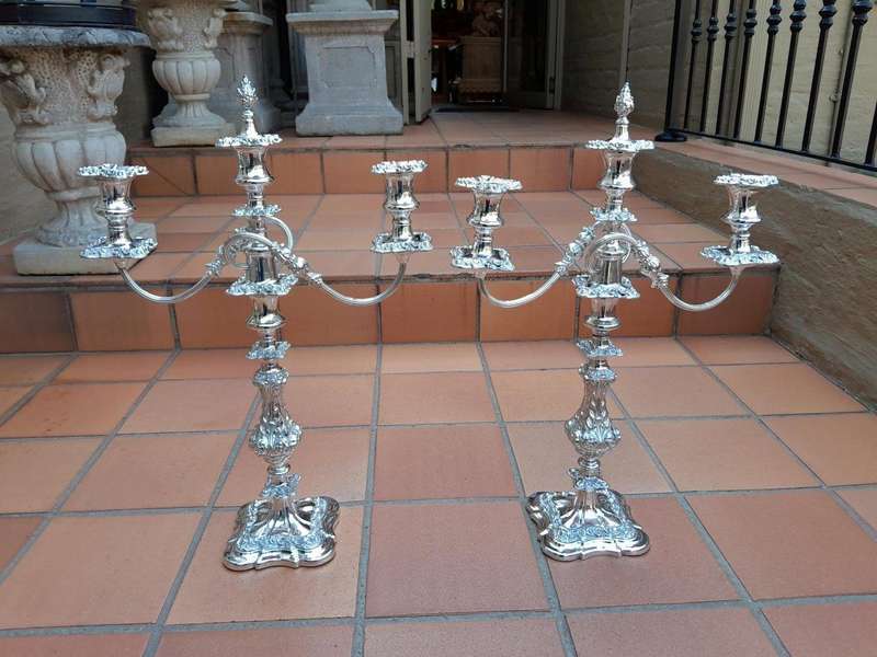 A 20TH Century Pair Of Silver-Plate Candelabras Of Large Proportions
