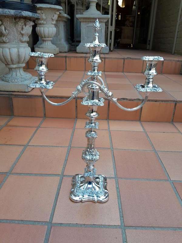 A 20TH Century Pair Of Silver-Plate Candelabras Of Large Proportions