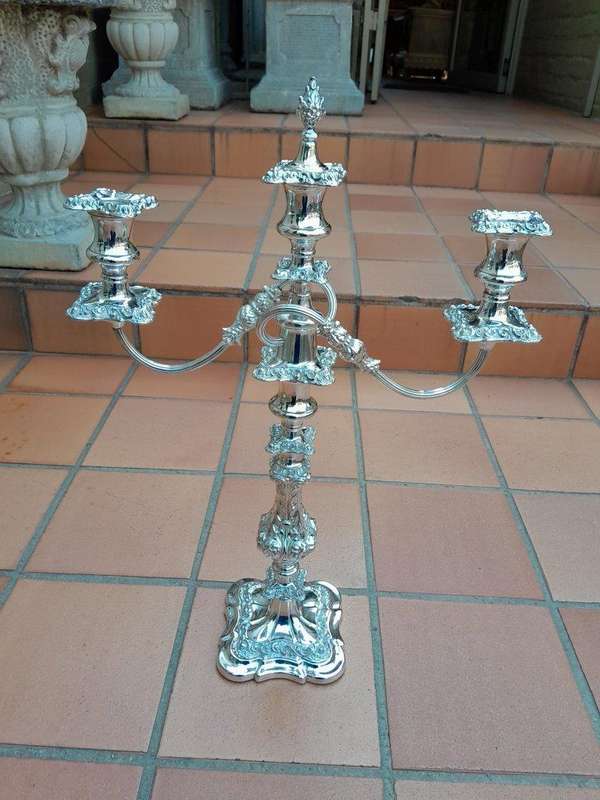 A 20TH Century Pair Of Silver-Plate Candelabras Of Large Proportions