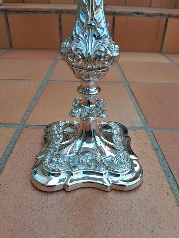 A 20TH Century Pair Of Silver-Plate Candelabras Of Large Proportions