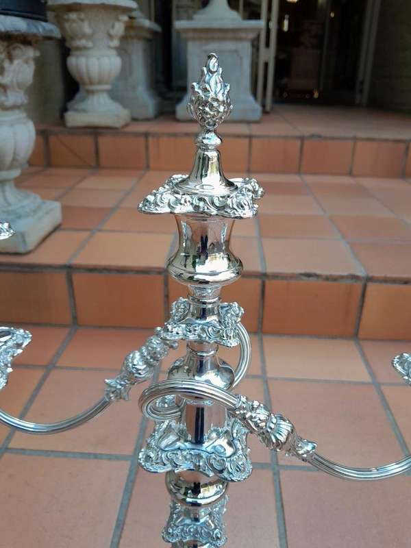 A 20TH Century Pair Of Silver-Plate Candelabras Of Large Proportions