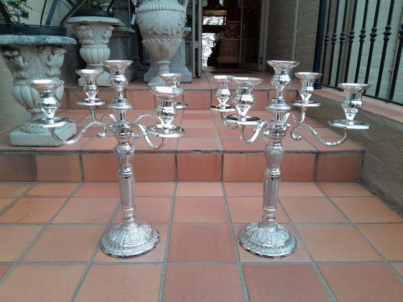 A 20TH Century Pair of Five Arm Candelabras