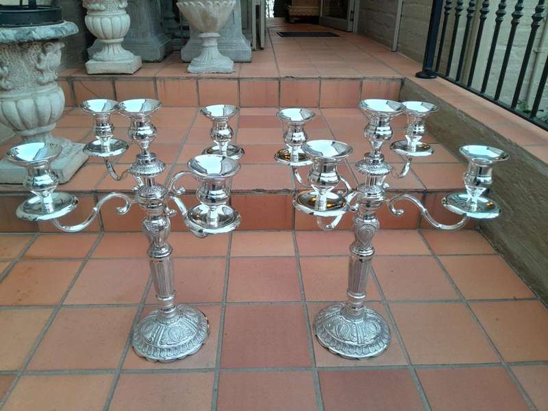 A 20TH Century Pair of Five Arm Candelabras