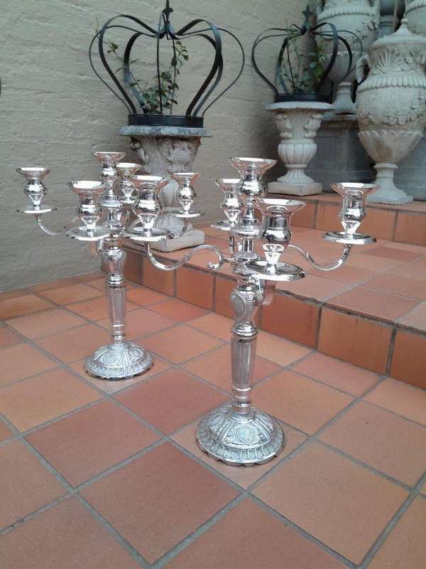 A 20TH Century Pair of Five Arm Candelabras