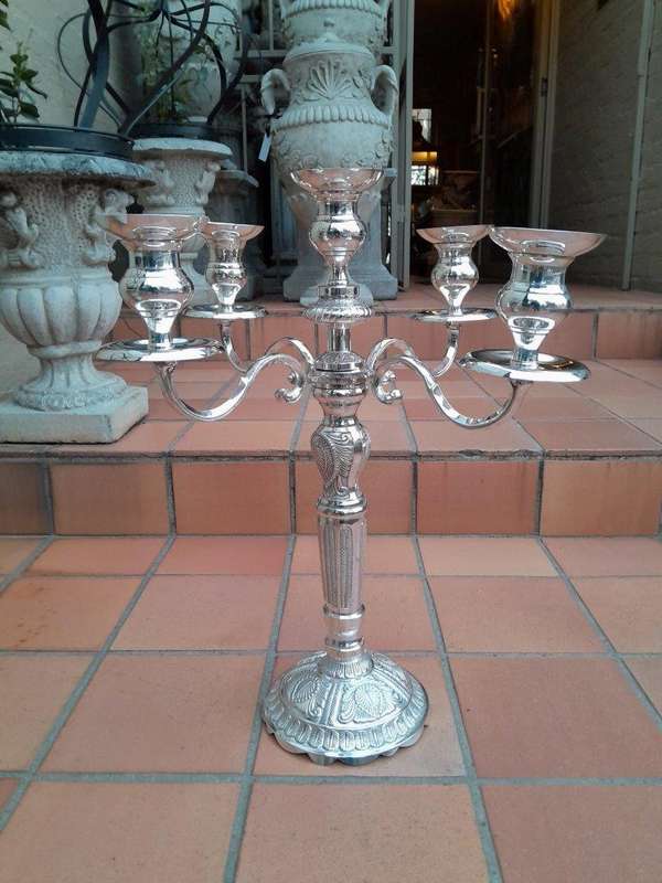 A 20TH Century Pair of Five Arm Candelabras