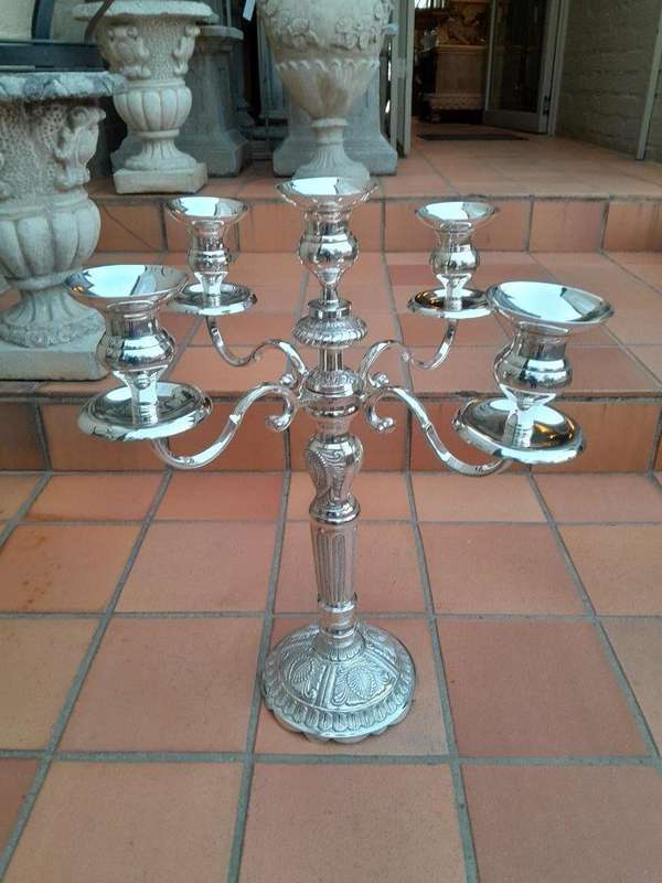 A 20TH Century Pair of Five Arm Candelabras