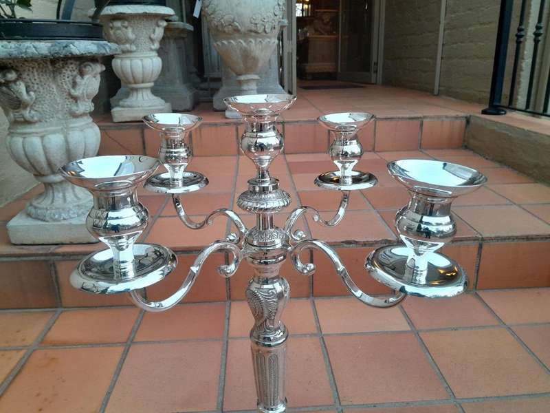 A 20TH Century Pair of Five Arm Candelabras