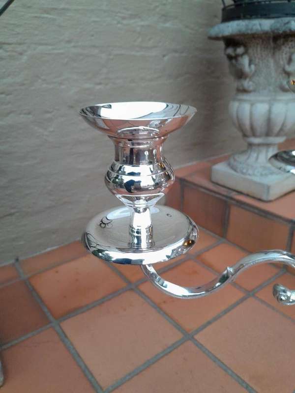 A 20TH Century Pair of Five Arm Candelabras