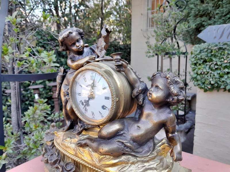 A French Louis XVI Bronze And Gilt Clock