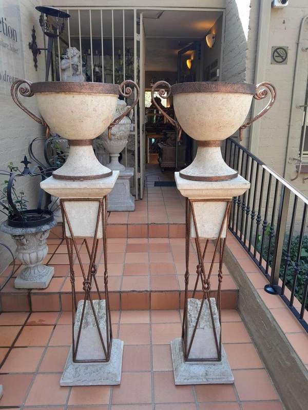 A 20th Century Decorative Pair Of Metal And Stone Urns On Stands