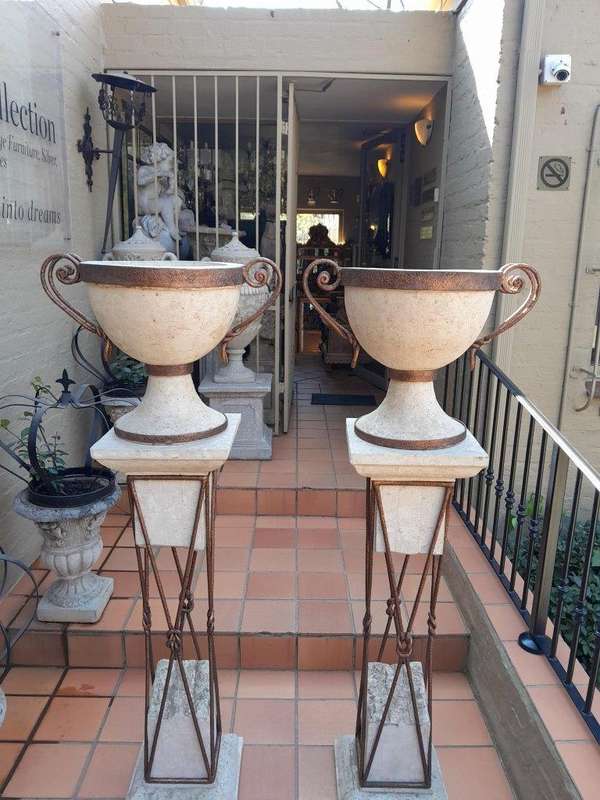 A 20th Century Decorative Pair Of Metal And Stone Urns On Stands
