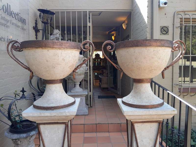 A 20th Century Decorative Pair Of Metal And Stone Urns On Stands