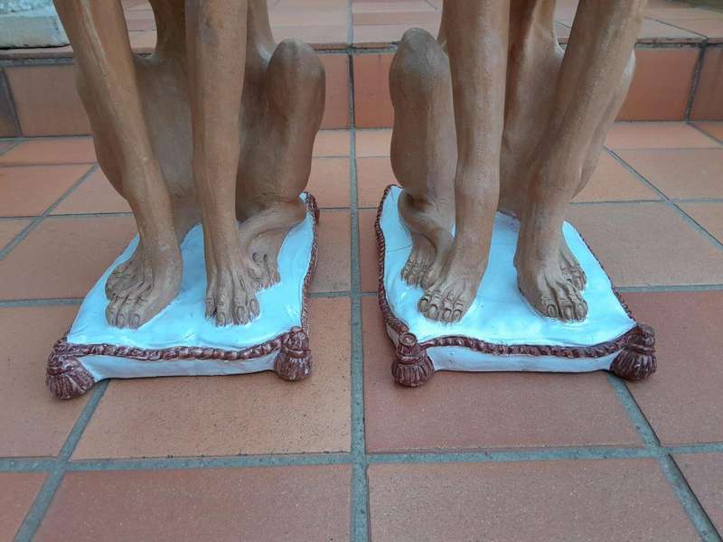 A 20th Century Pair Of Ceramic Whippets On Cushion Bases