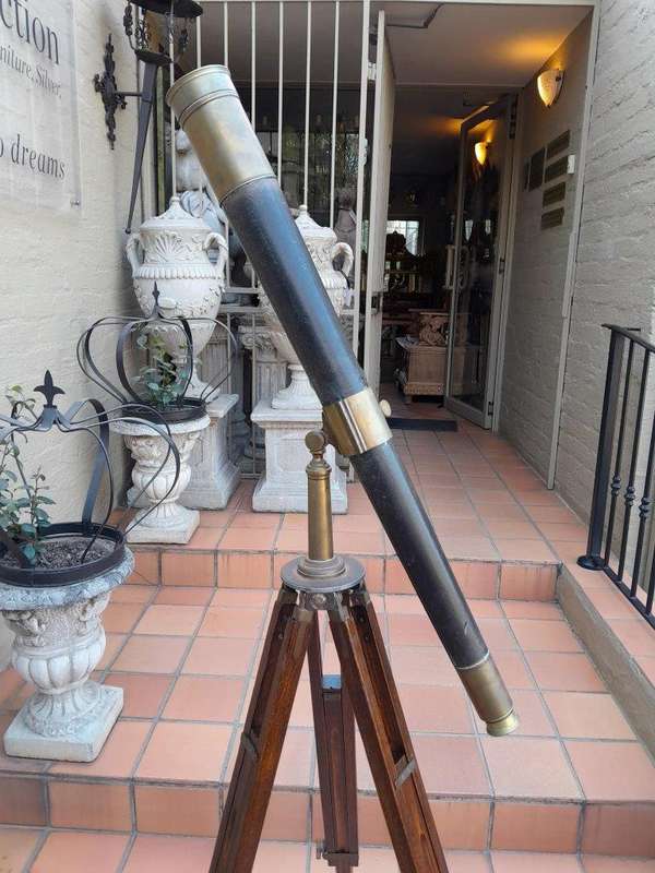 An Antique Brass And Leather Telescope On Brass And Oak Tripod Stand