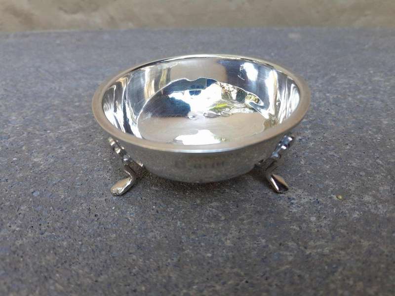An English Elizabeth II Circa 1956 Georgian-style  Silver Tea Strainer  on Feet  Dimensions: ...