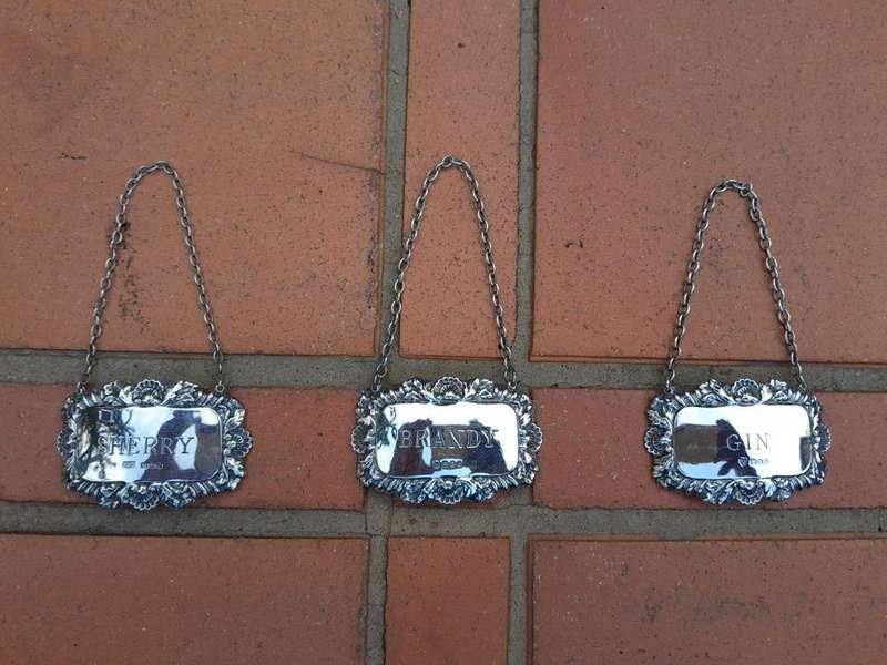 A Set of Three English Elizabeth II Silver Decanter Labels    Gin, Sherry, Brandy  Mass 41grams