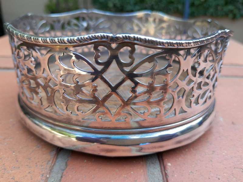 A Silver-plated Wine Bottle Coaster