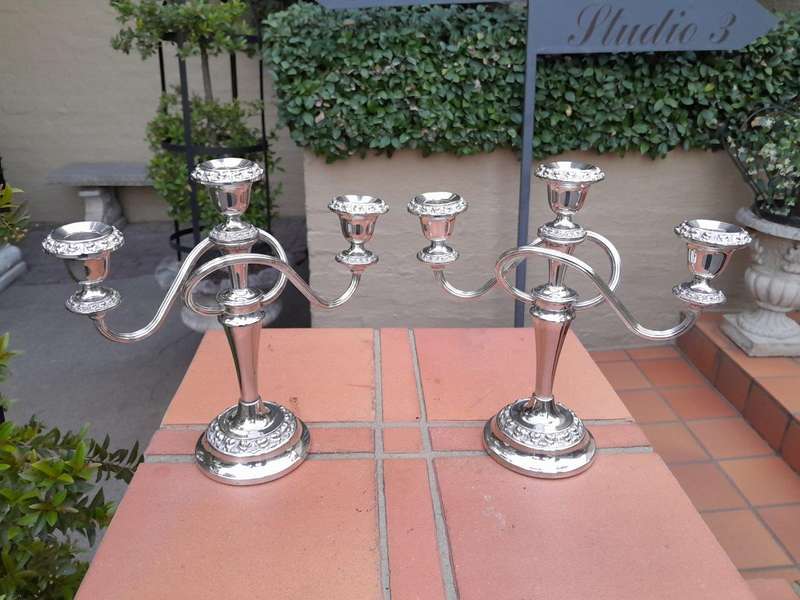 A 20TH Century Pair of Silver Plate Candelabras