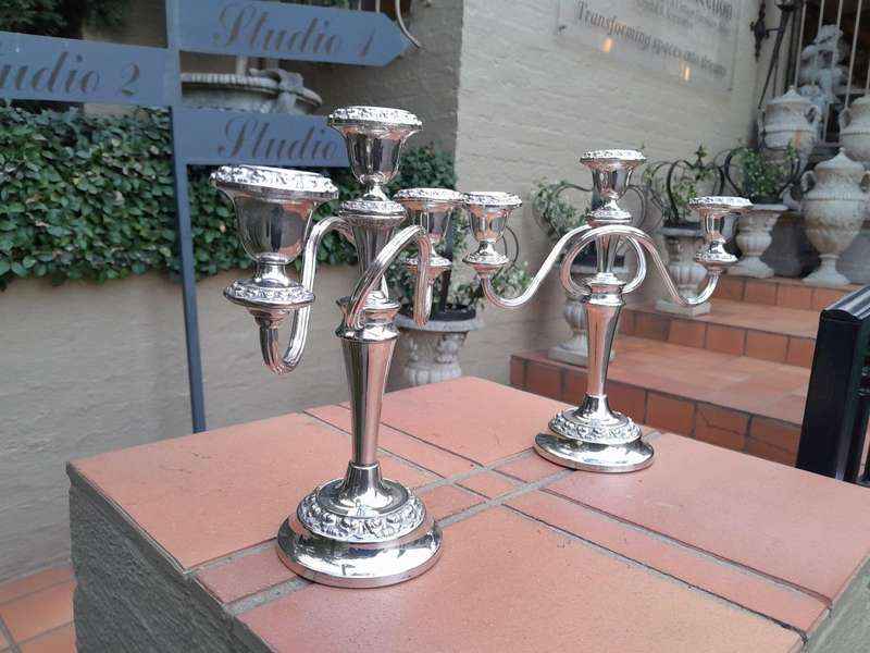 A 20TH Century Pair of Silver Plate Candelabras