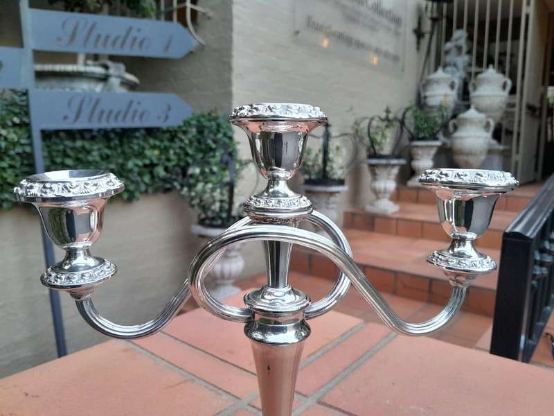 A 20TH Century Pair of Silver Plate Candelabras