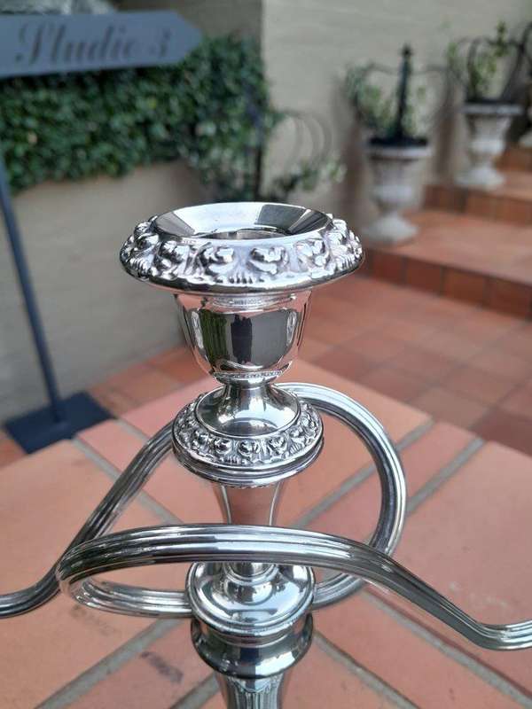 A 20TH Century Pair of Silver Plate Candelabras