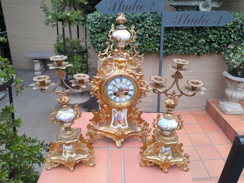 An Antique Century French Rococo Style Clock Garniture Set with Pair of Candelabras  with  Pend...
