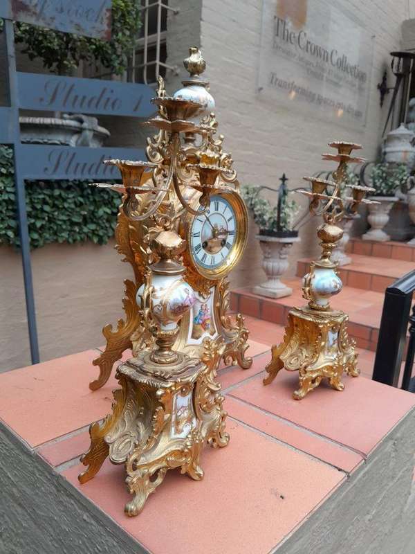 An Antique Century French Rococo Style Clock Garniture Set with Pair of Candelabras  with  Pend...