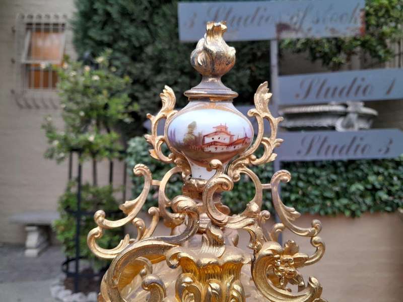 An Antique Century French Rococo Style Clock Garniture Set with Pair of Candelabras  with  Pend...