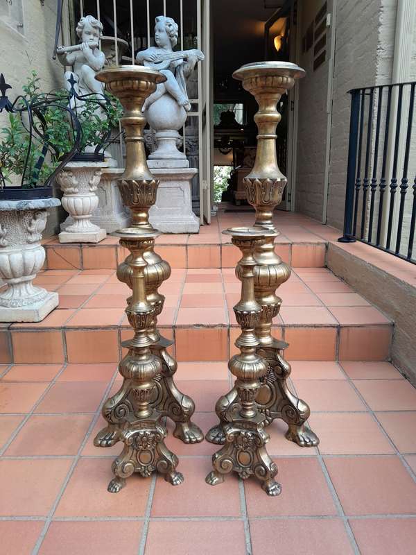 A 20th Century Set Of Four (Two Sized Pairs) Of Solid Brass Rococo Style Candelabras