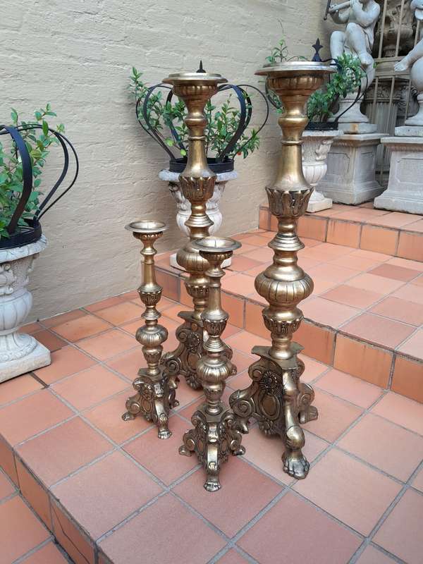 A 20th Century Set Of Four (Two Sized Pairs) Of Solid Brass Rococo Style Candelabras