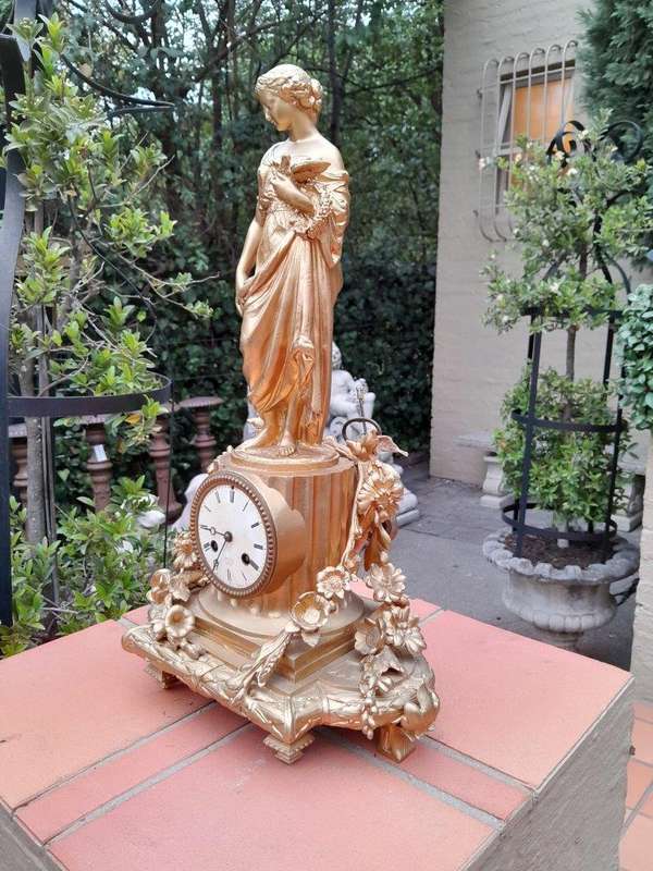 An Antique French Louis XVI Figural Clock with Pendulum and Key