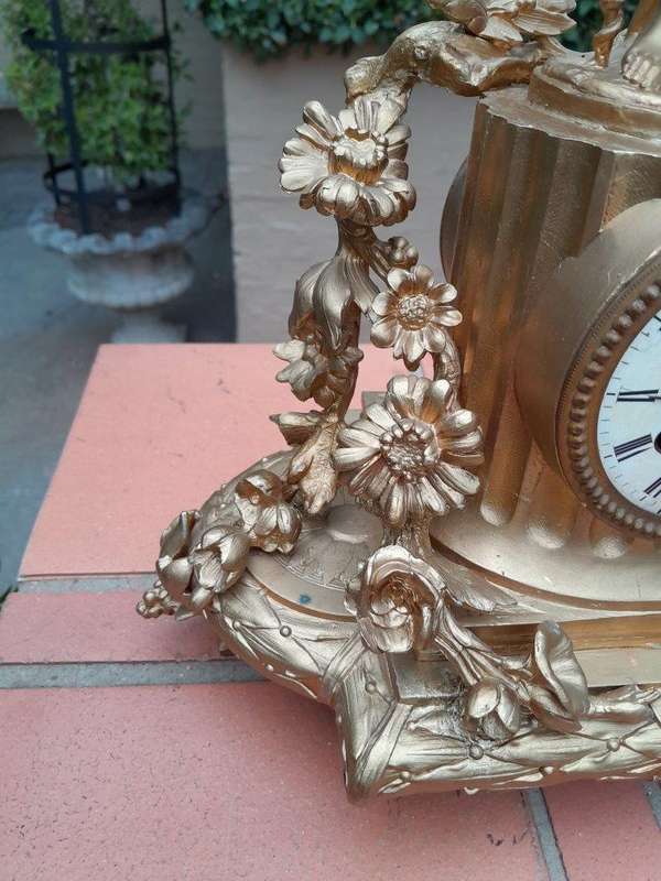 An Antique French Louis XVI Figural Clock with Pendulum and Key