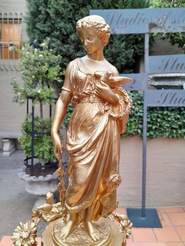 An Antique French Louis XVI Figural Clock with Pendulum and Key