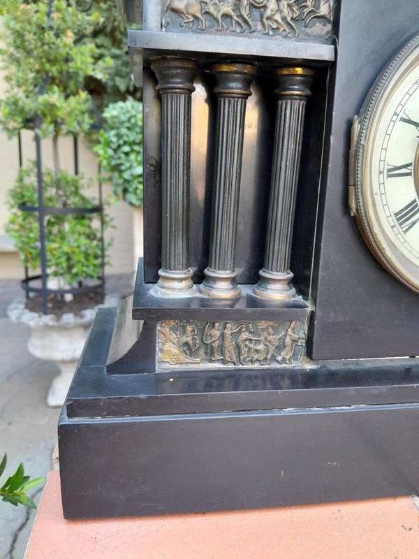 An Antique French Black Slate And Marble Clock