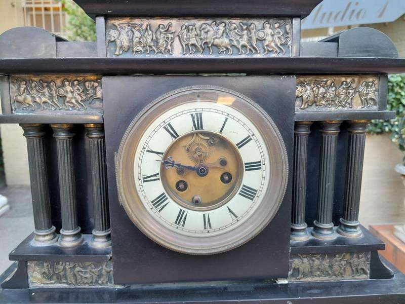 An Antique French Black Slate And Marble Clock
