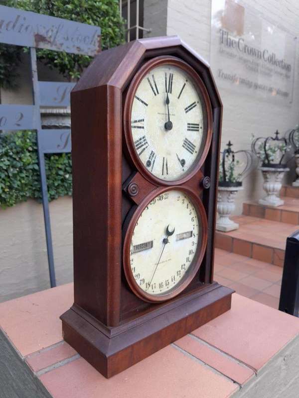An Antique Late 19th Century Mahogany Calendar Clock With Date And Time Dials