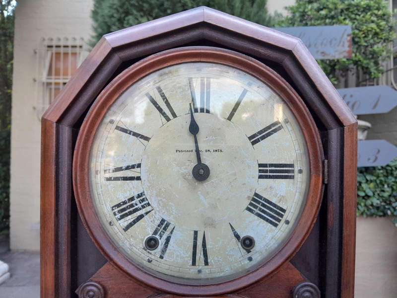 An Antique Late 19th Century Mahogany Calendar Clock With Date And Time Dials