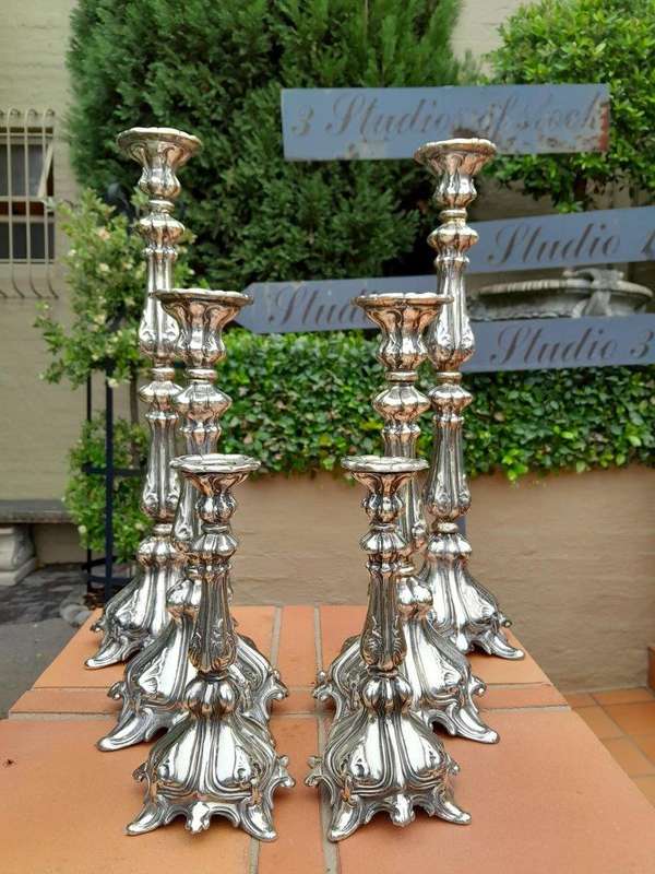 A  20th Century Ornate Set of Six Candlesticks / Holders / Sticks as in Three Graduated Pairs of...