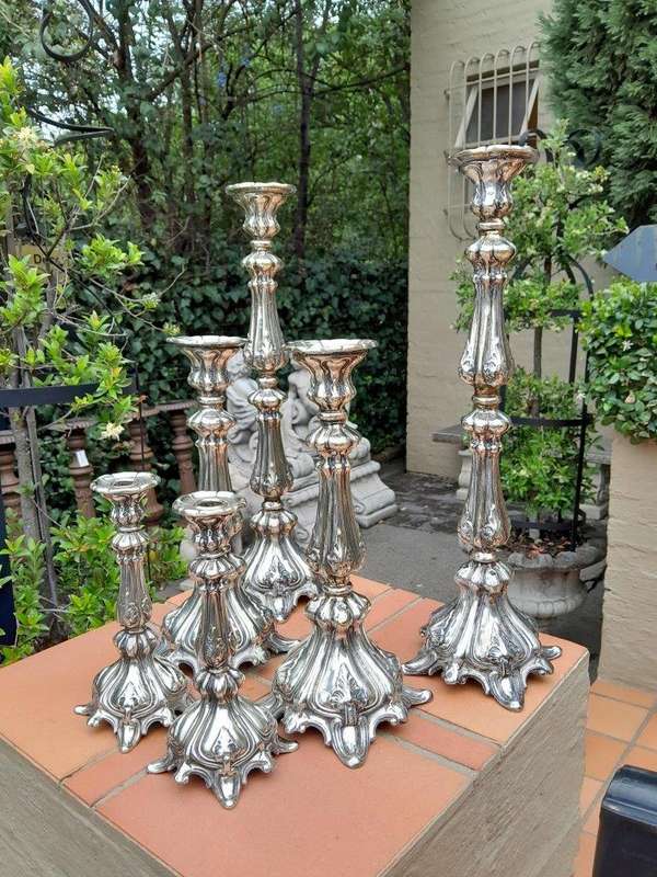A  20th Century Ornate Set of Six Candlesticks / Holders / Sticks as in Three Graduated Pairs of...
