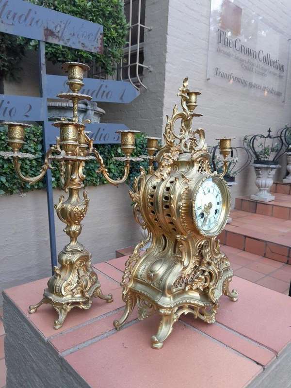 An Antique 19th Century French Rococo Gilt Ormolu Clock Garniture Set with a  Pair of Matching C...
